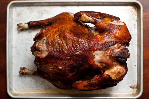 Rowdy Horn checks the turkey he is deep frying for Thanksgiving